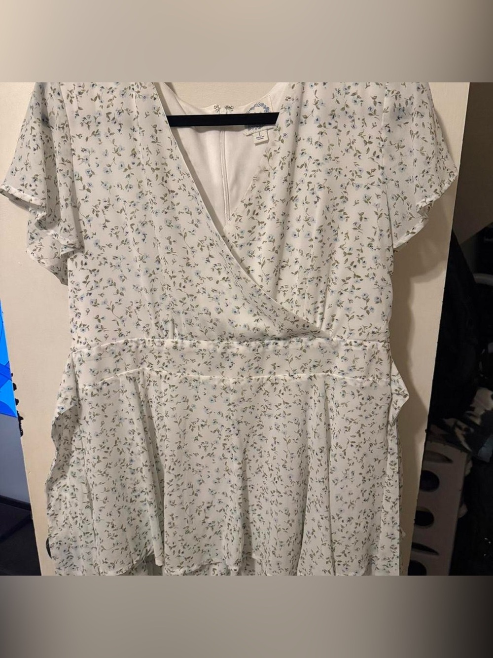 Francesca’s white floral romper